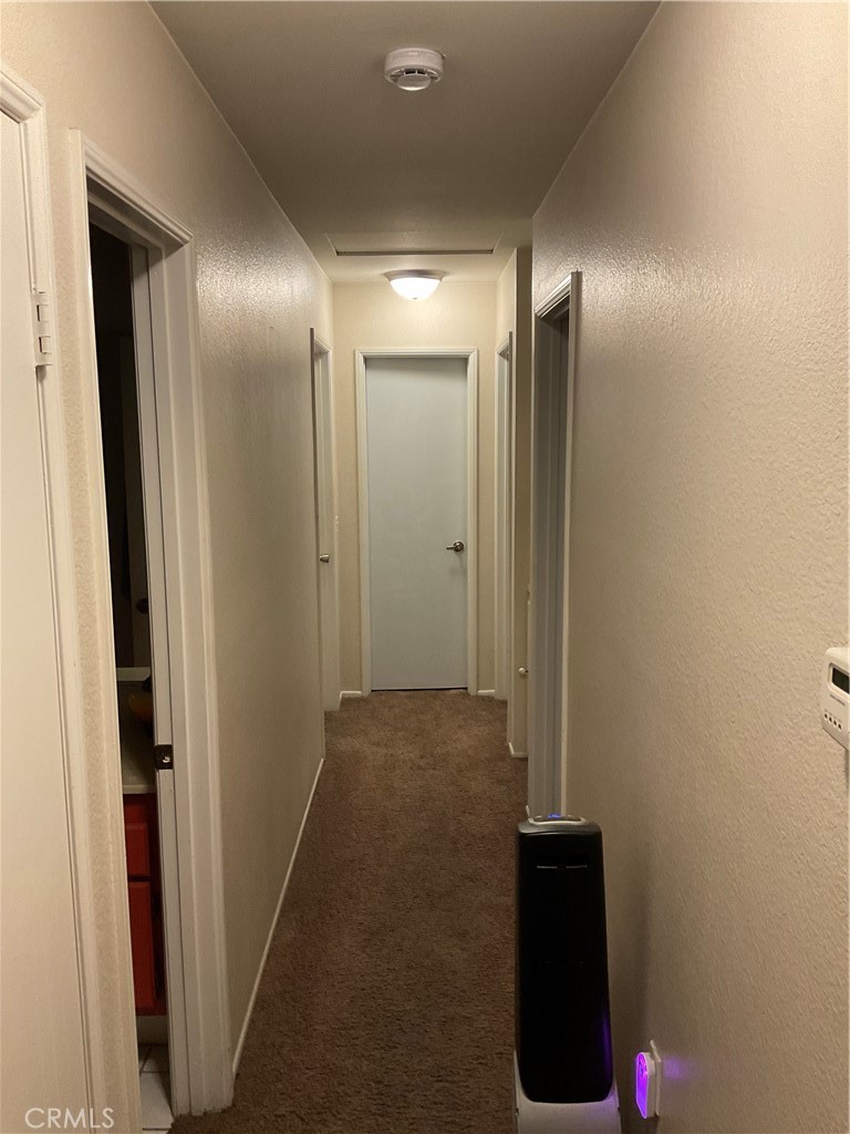5858 Maybrook Circle Riverside, CA 92506 - Photo 14 of 20 Hallway to Bedrooms
