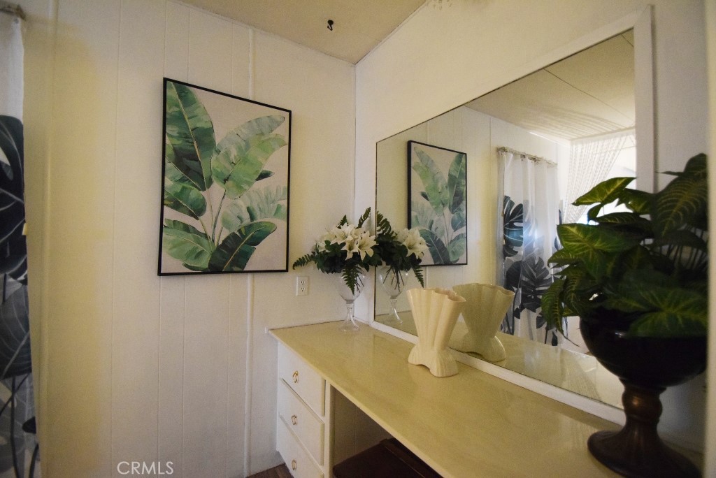 7425 Church Street, Unit 10 Yucca Valley, CA 92284 - Photo 18 of 24 a view of a dining room with furniture and wooden floor