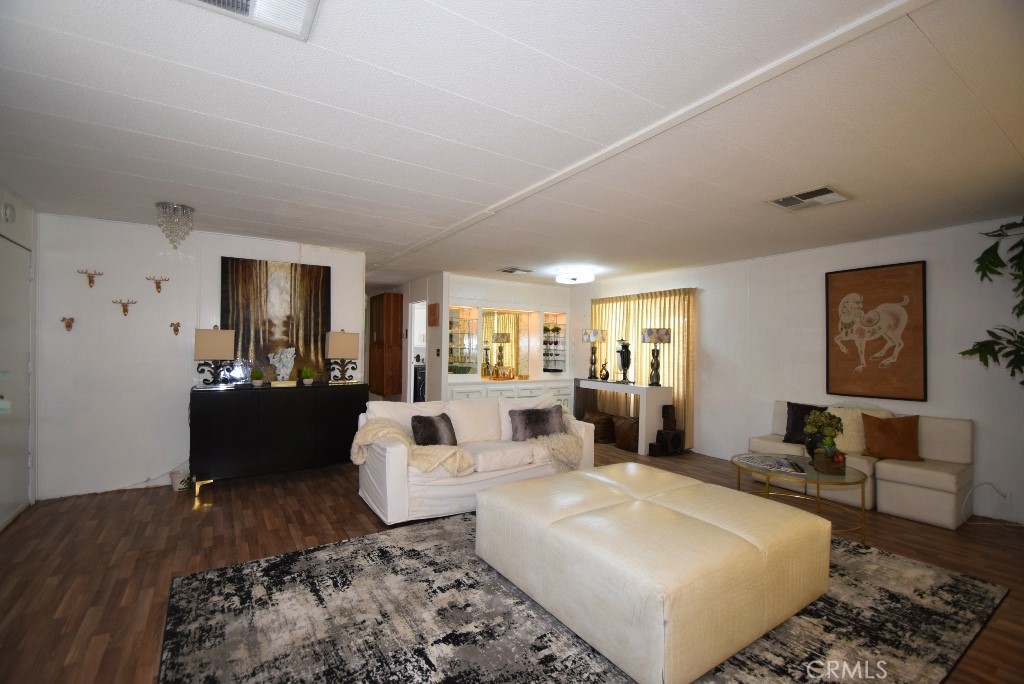 7425 Church Street, Unit 10 Yucca Valley, CA 92284 - Photo 7 of 24 a living room with furniture and a couch