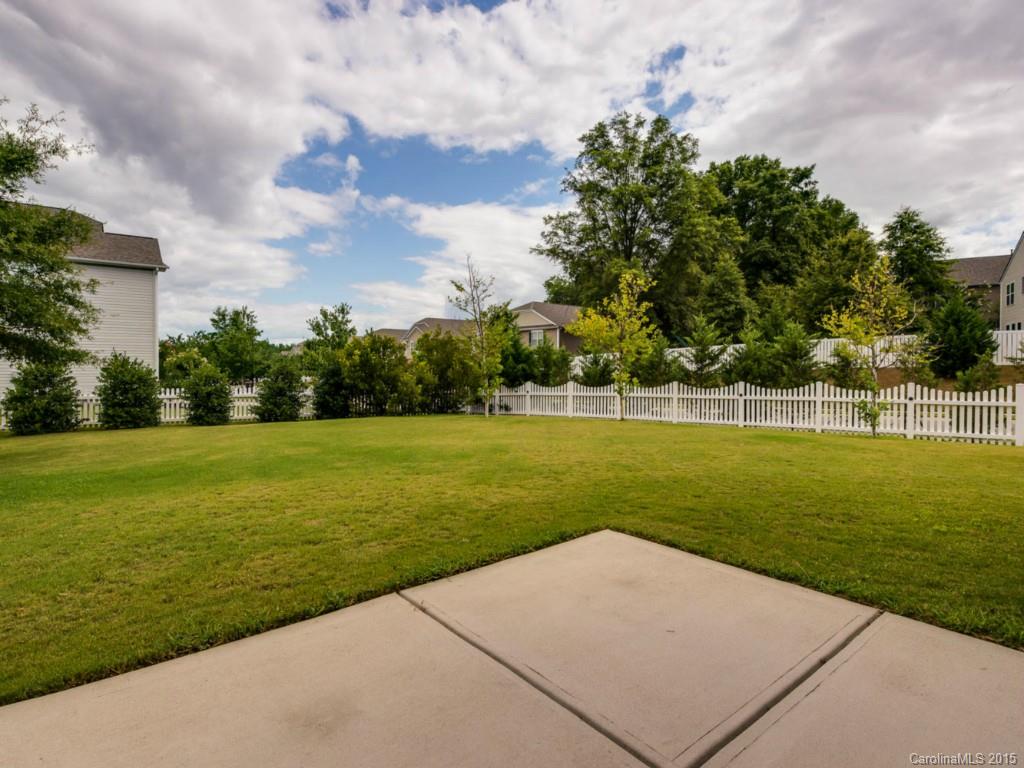 306 Allspice Road Fort Mill, SC 29708 - Photo 2 of 24 a view of a garden and basketball court