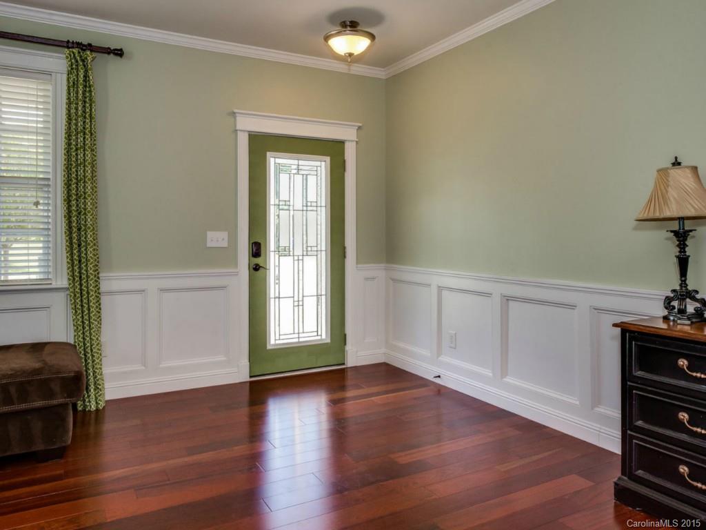306 Allspice Road Fort Mill, SC 29708 - Photo 15 of 24 an empty room with wooden floor and windows