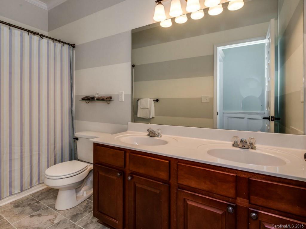 306 Allspice Road Fort Mill, SC 29708 - Photo 20 of 24 a bathroom with a sink toilet and shower