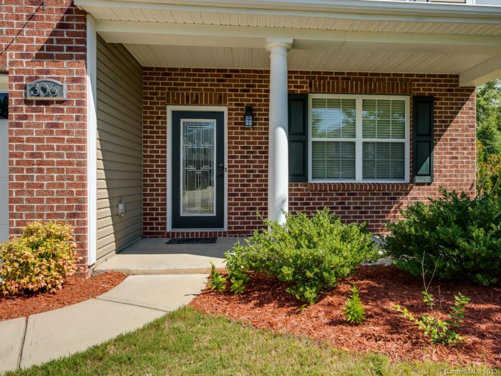 306 Allspice Road Fort Mill, SC 29708 - Photo 23 of 24 a front view of a house with garden