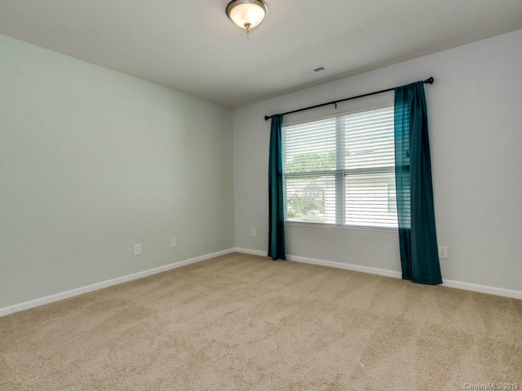 306 Allspice Road Fort Mill, SC 29708 - Photo 10 of 24 a view of an empty room with a window
