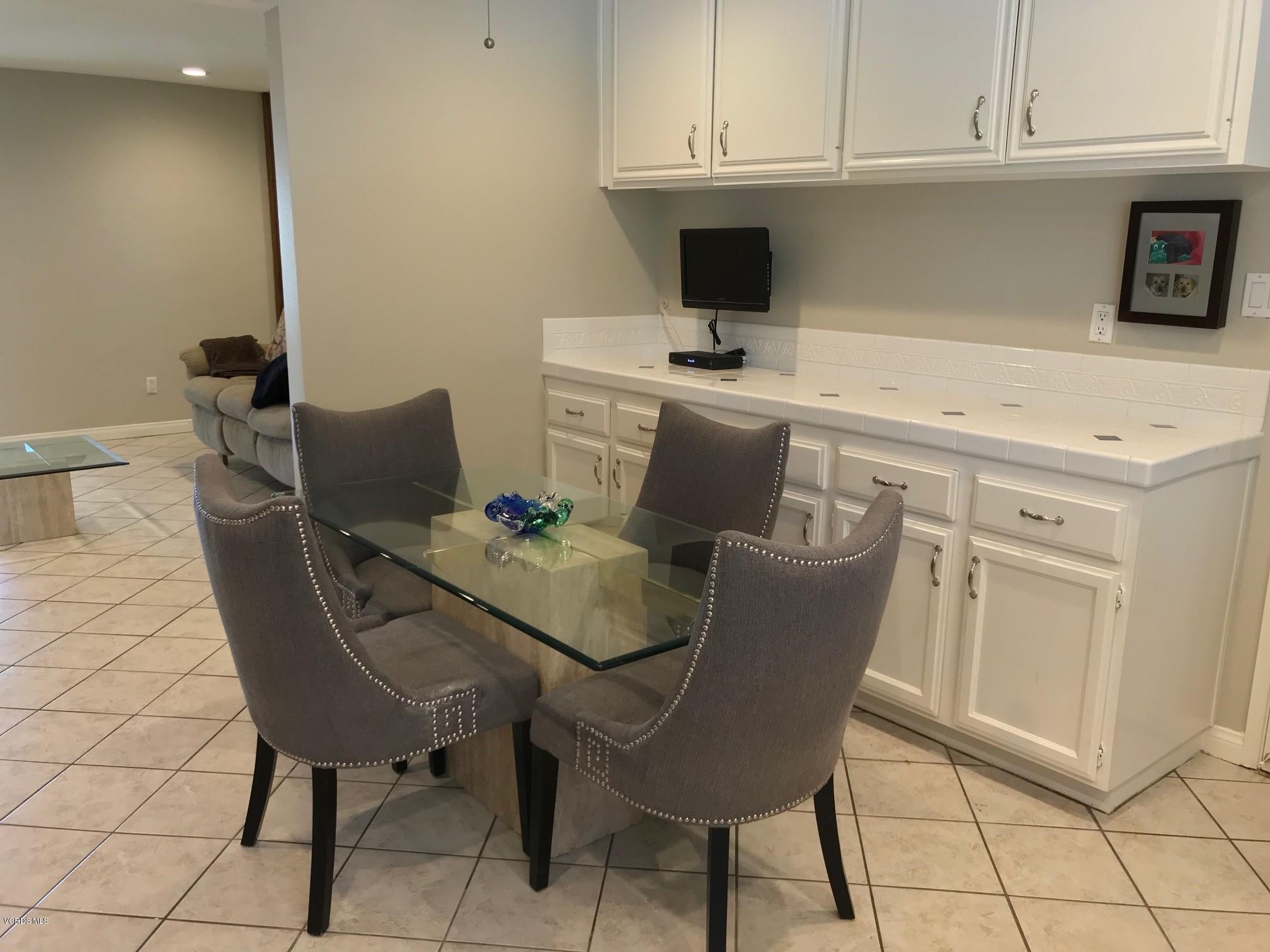 2227 Ralston Street Simi Valley, CA 93063 - Photo 13 of 35 a dining room with furniture and wooden floor