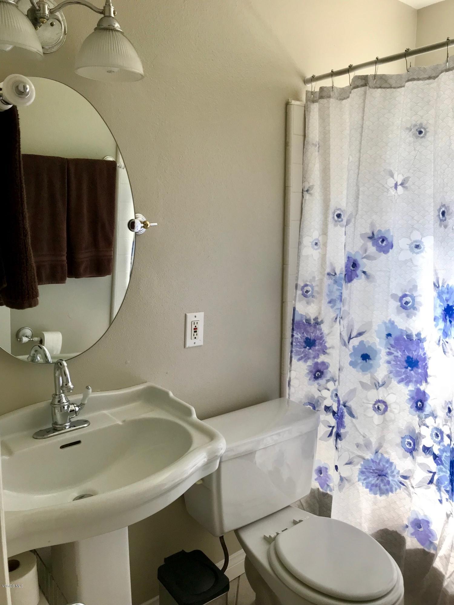 2227 Ralston Street Simi Valley, CA 93063 - Photo 18 of 35 a bathroom with a sink toilet and shower