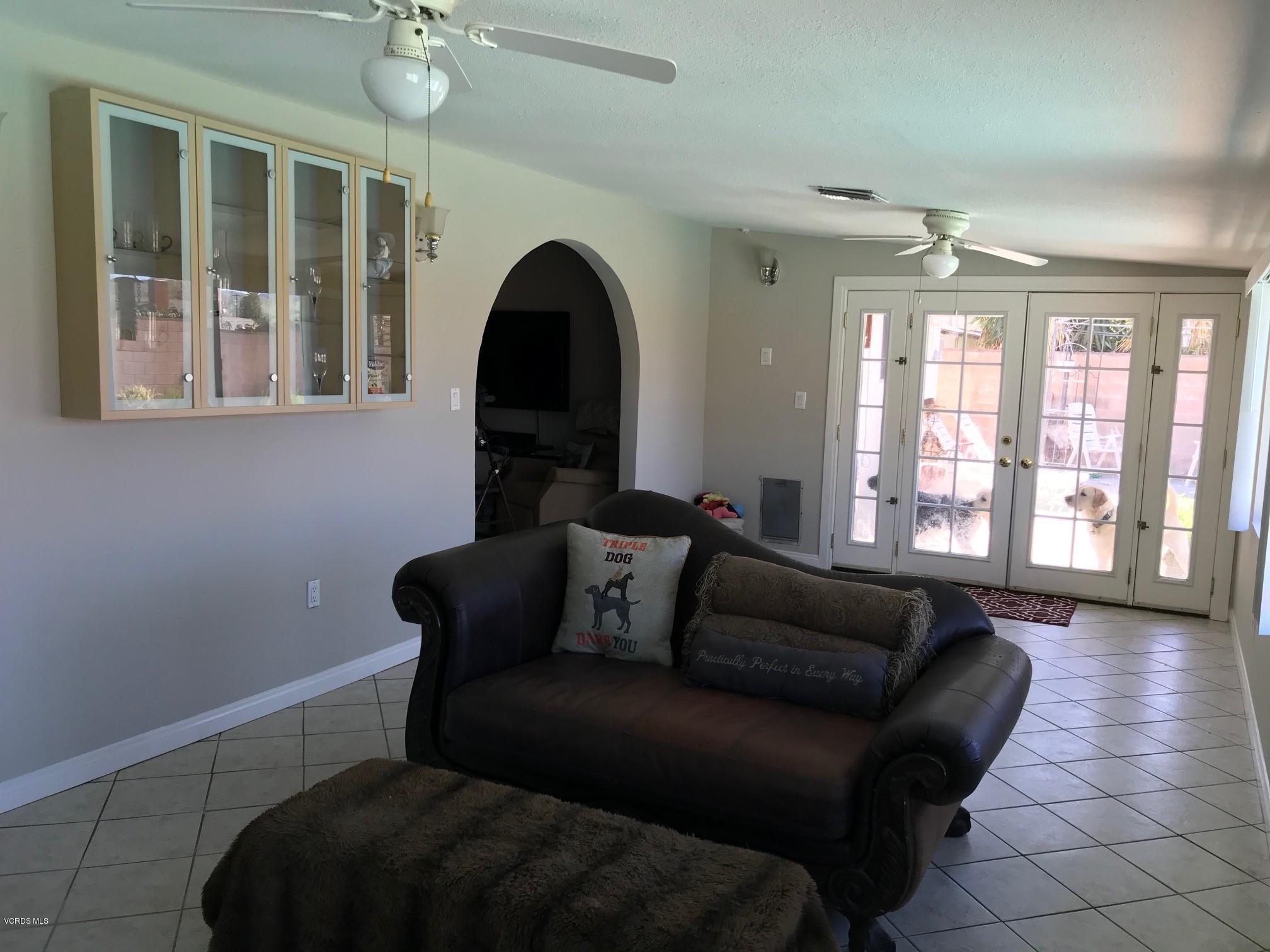 2227 Ralston Street Simi Valley, CA 93063 - Photo 29 of 35 a living room with furniture and a large window