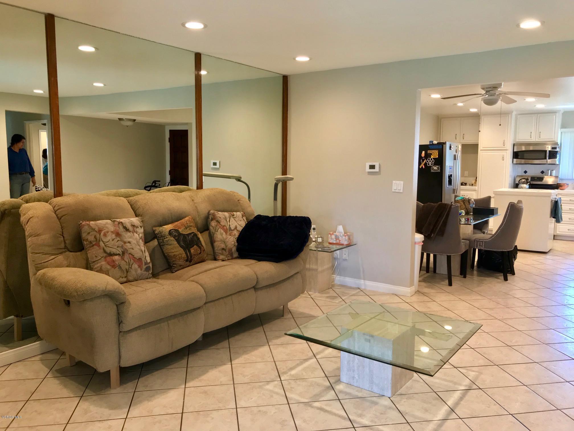 2227 Ralston Street Simi Valley, CA 93063 - Photo 6 of 35 a living room with furniture and kitchen view