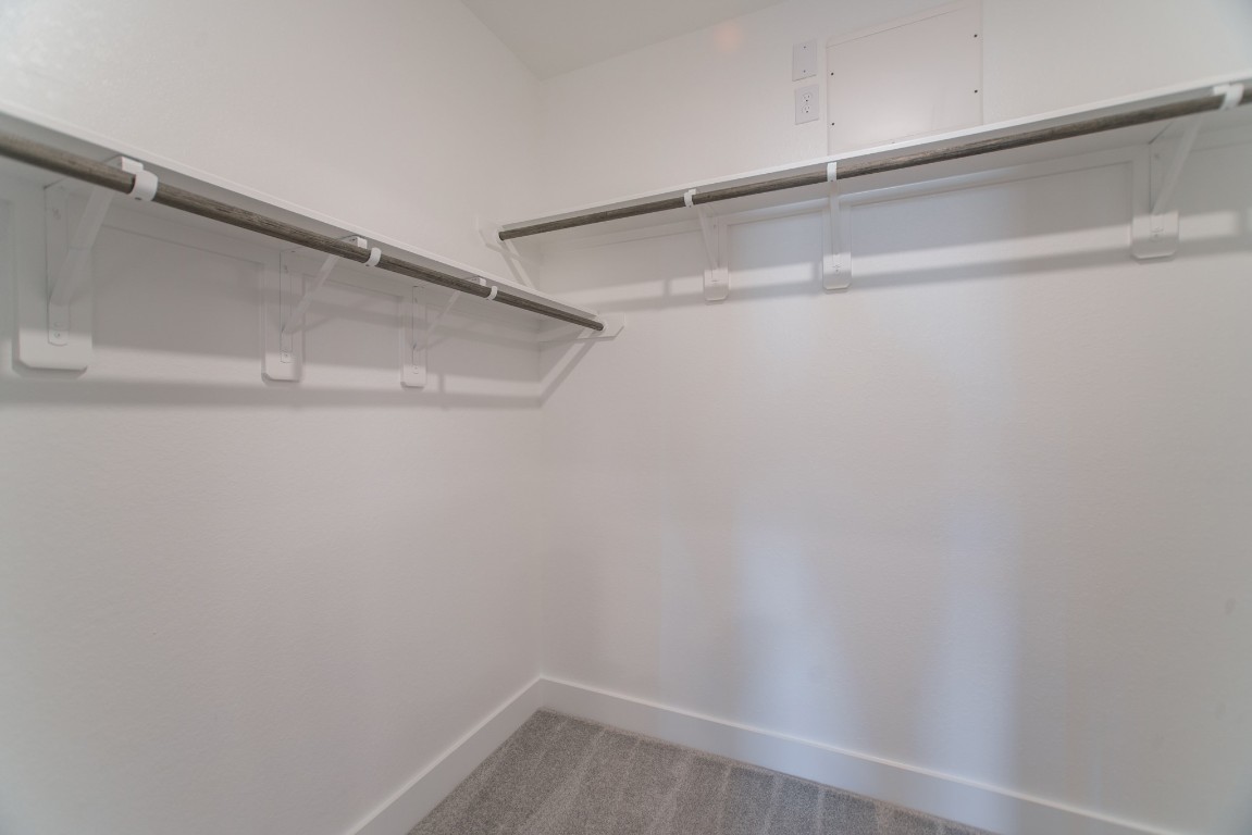 10627 Whitejacket Conroe, TX 77385 - Photo 29 of 46 a view of an empty walk in closet
