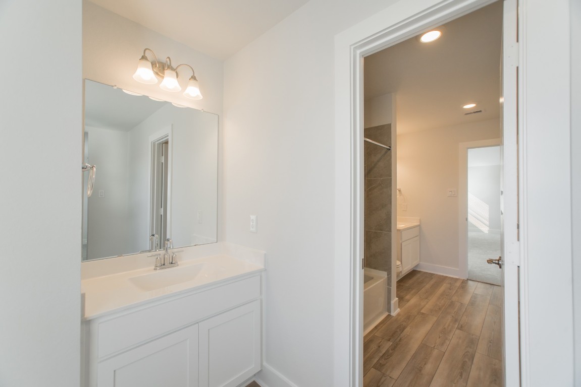 10627 Whitejacket Conroe, TX 77385 - Photo 43 of 46 a bathroom with a sink and a mirror