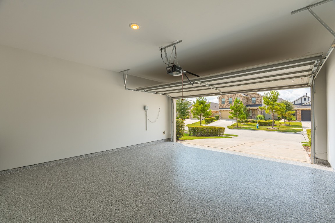 10627 Whitejacket Conroe, TX 77385 - Photo 5 of 46 a view of an empty room with a window