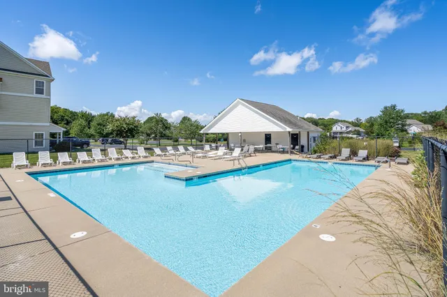 a view of a house with swimming pool