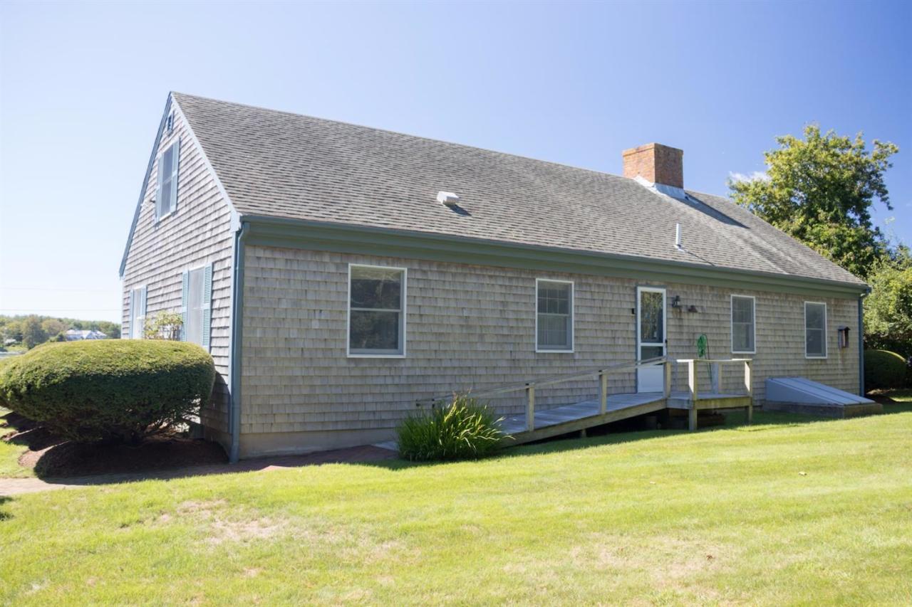 12 Pond Street Chatham, MA 02633 - Photo 14 of 16 a view of a house with a yard