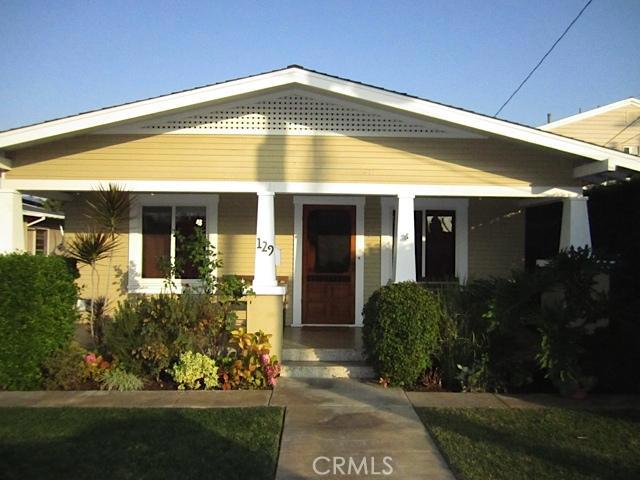129 North Parker Street Orange, CA 92868 - Photo 1 of 17 a front view of a house with a yard
