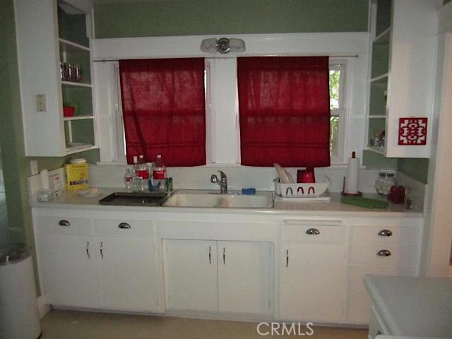 129 North Parker Street Orange, CA 92868 - Photo 11 of 17 a bathroom with a sink and a mirror