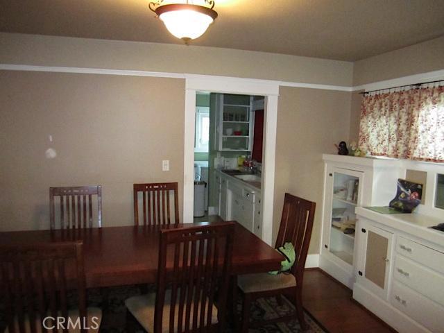 129 North Parker Street Orange, CA 92868 - Photo 13 of 17 a view of a dining room with furniture window and wooden floor