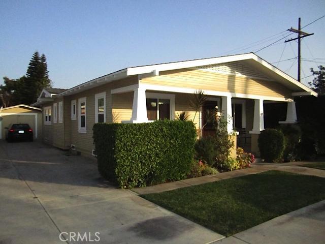 129 North Parker Street Orange, CA 92868 - Photo 3 of 17 a front view of a house with garden