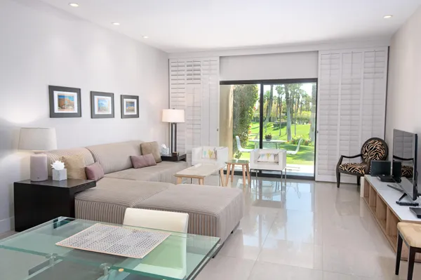 a bedroom with bed and a lamp