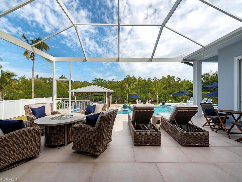 2323 Harbor Road Naples, FL 34104 - Photo 21 of 39 Screened-in lanai