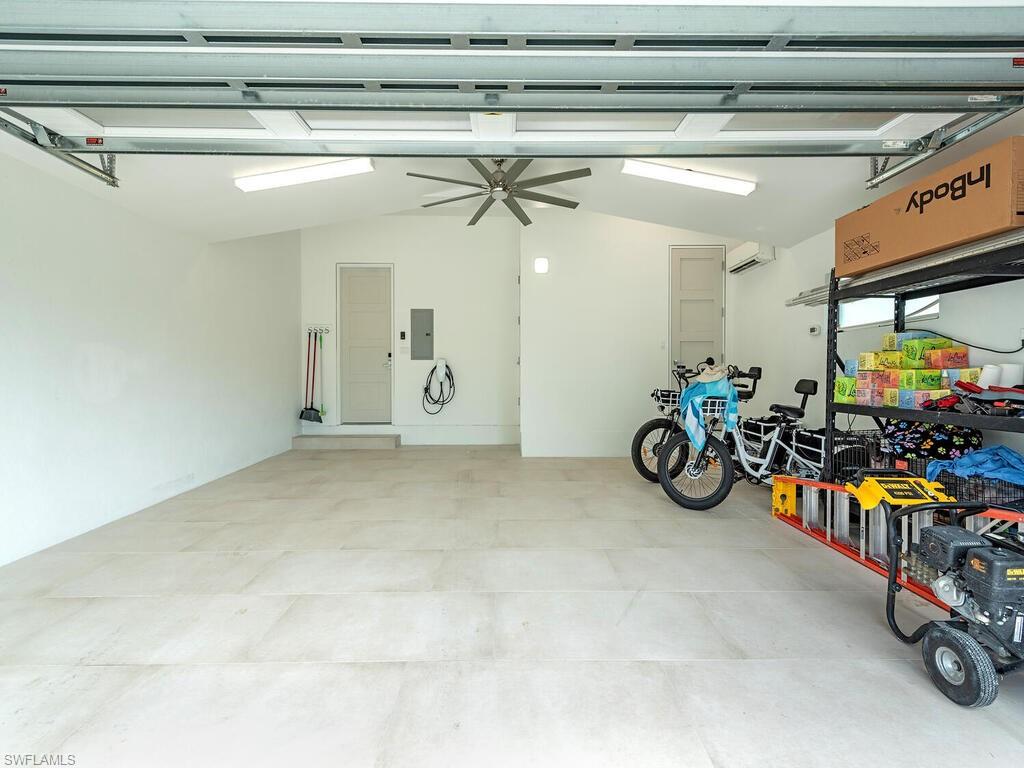 2323 Harbor Road Naples, FL 34104 - Photo 36 of 39 Attached garage with a/c and EV charging station