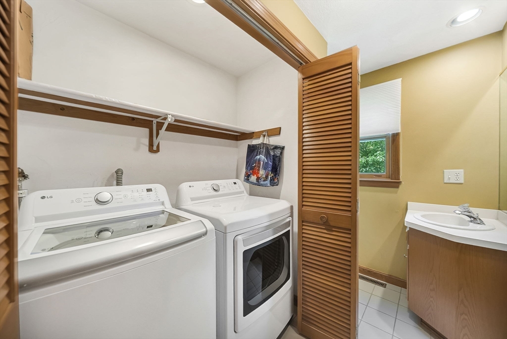 83 Jefferson Road Franklin, MA 02038 - Photo 12 of 34 a utility room with dryer and washer