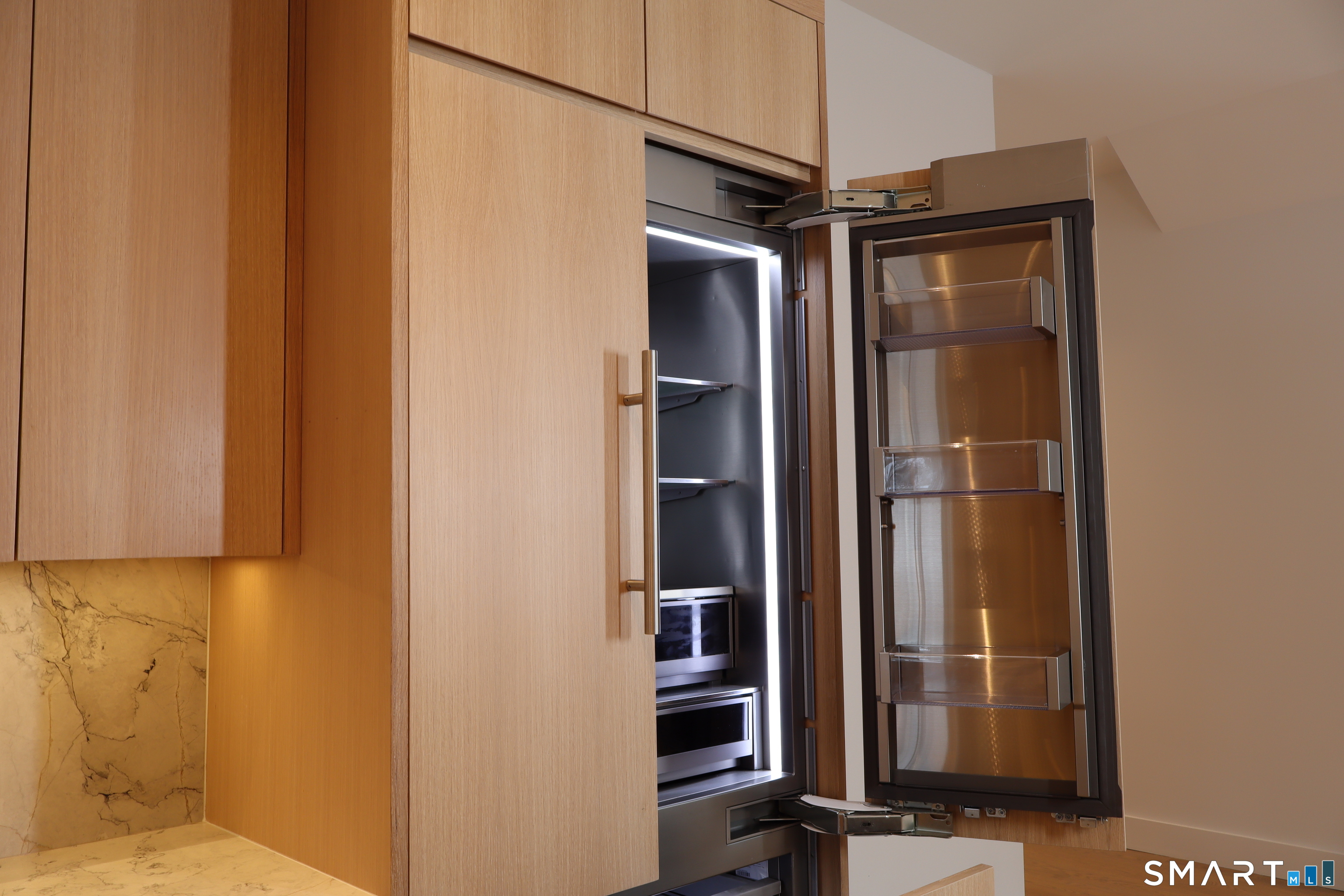 173 Belltown Road Stamford, CT 06905 - Photo 12 of 31 a view of a bathroom with a glass door