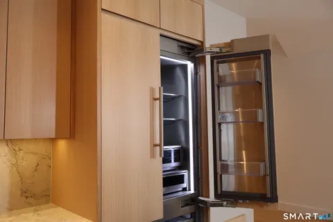a view of a bathroom with a glass door