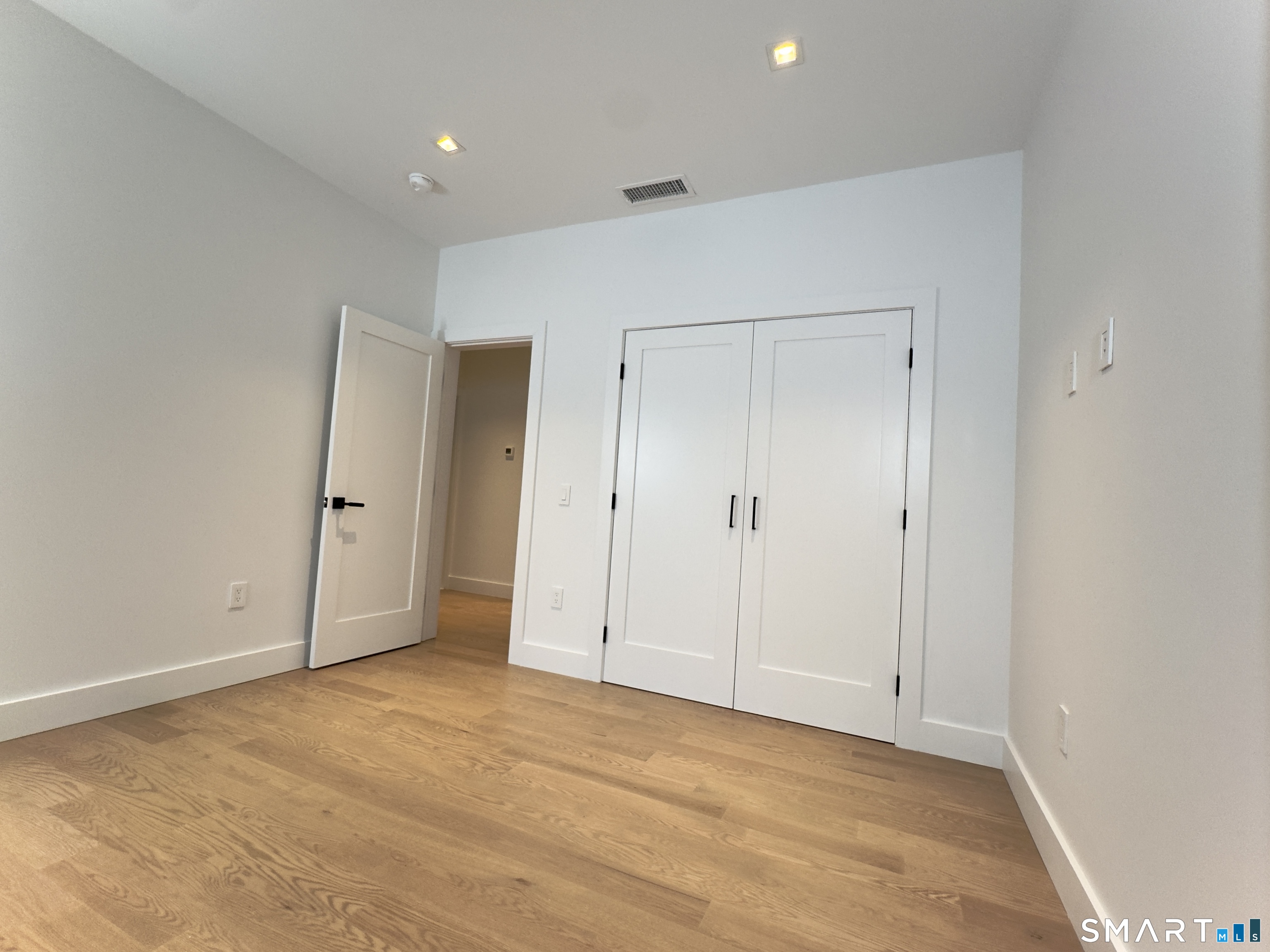 173 Belltown Road Stamford, CT 06905 - Photo 25 of 42 a view of an empty room