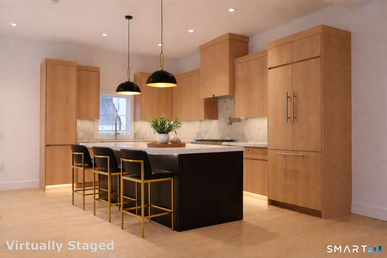 173 Belltown Road Stamford, CT 06905 - Photo 9 of 42 a kitchen with stainless steel appliances kitchen island granite countertop a table chairs and a refrigerator