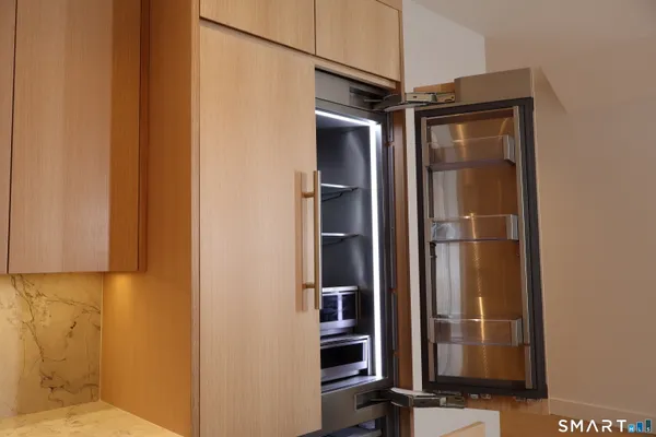 a view of a bathroom with a glass door