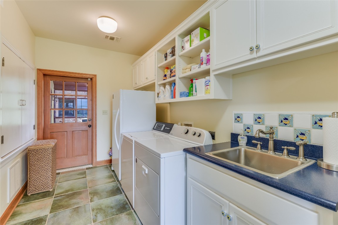 363 Paint Creek S Road, Unit A Paige, TX 78659 - Photo 21 of 40 a room with furniture a washer and dryer