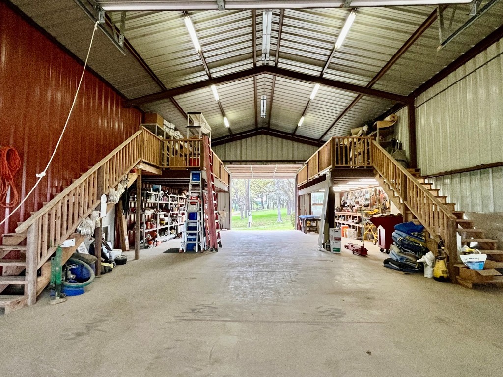 363 Paint Creek S Road, Unit A Paige, TX 78659 - Photo 34 of 40 a view of a garage with parked cars