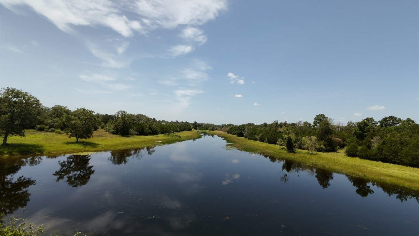 363 Paint Creek S Road, Unit A Paige, TX 78659 - Photo 5 of 40 a view of a lake with houses in the back