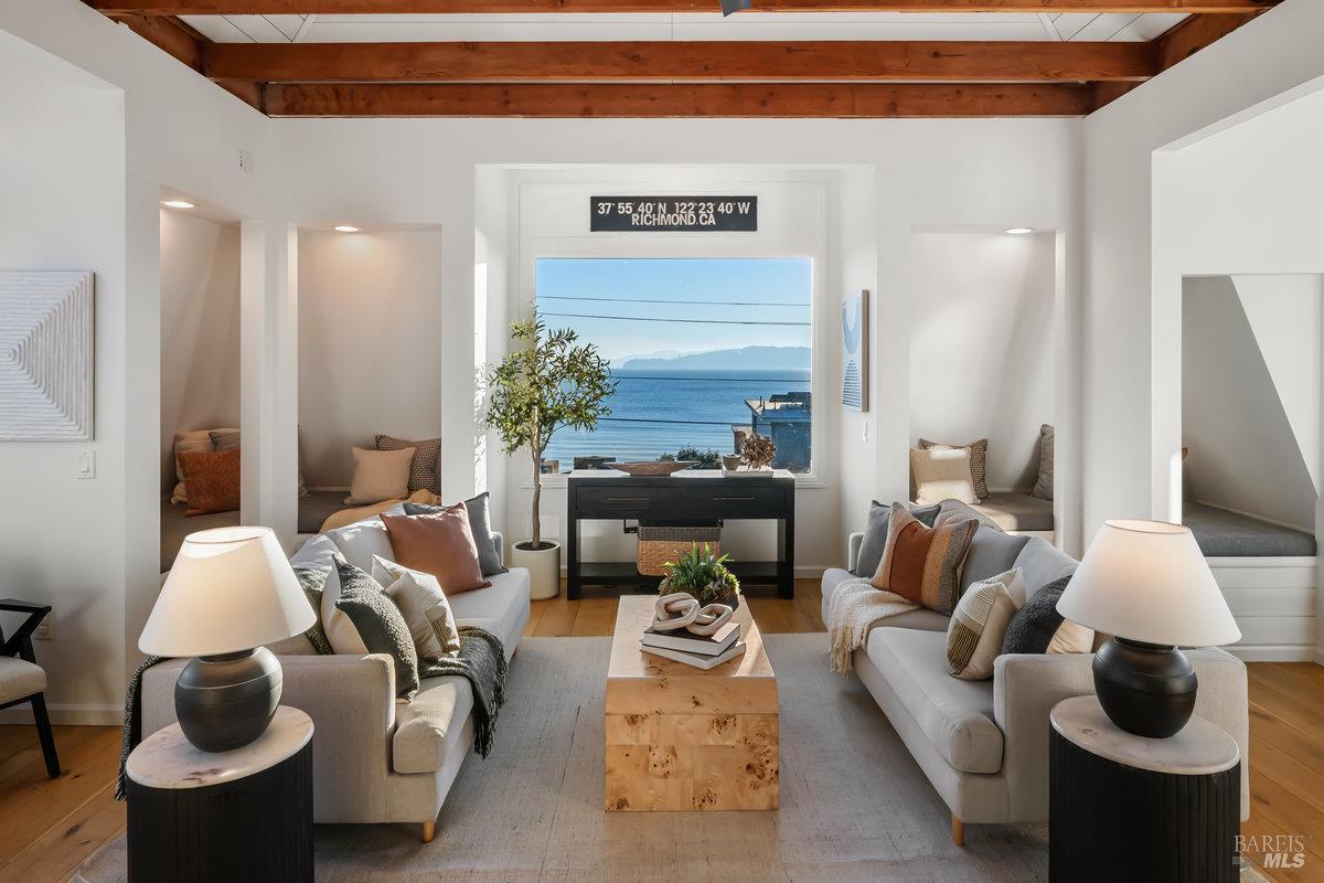 700 Ocean Avenue Point Richmond, CA 94801 - Photo 15 of 95 a living room with furniture and a lamp