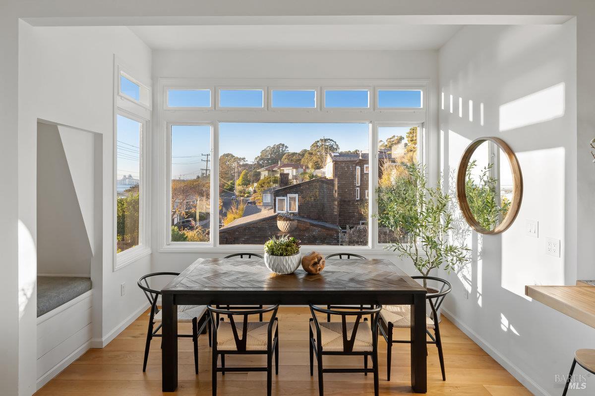 700 Ocean Avenue Point Richmond, CA 94801 - Photo 19 of 95 a view of a dining room with furniture window and wooden floor