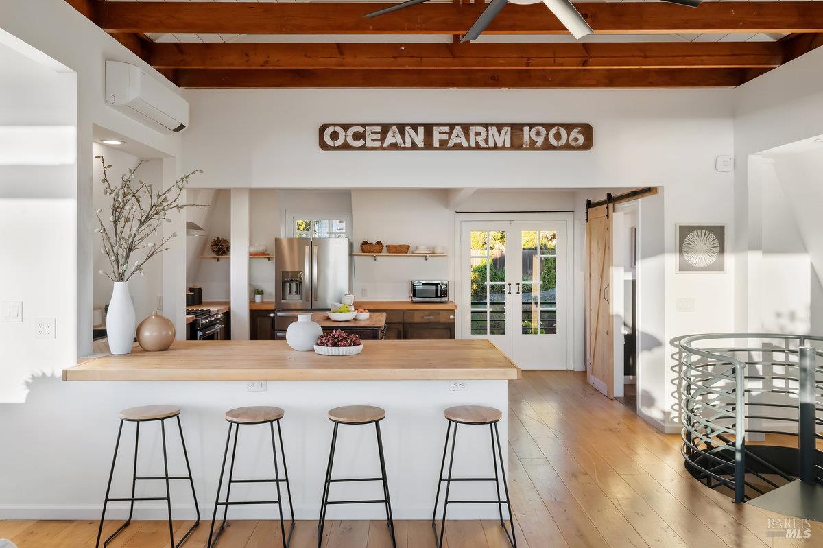 700 Ocean Avenue Point Richmond, CA 94801 - Photo 22 of 95 a view of a kitchen with granite countertop a refrigerator and a stove