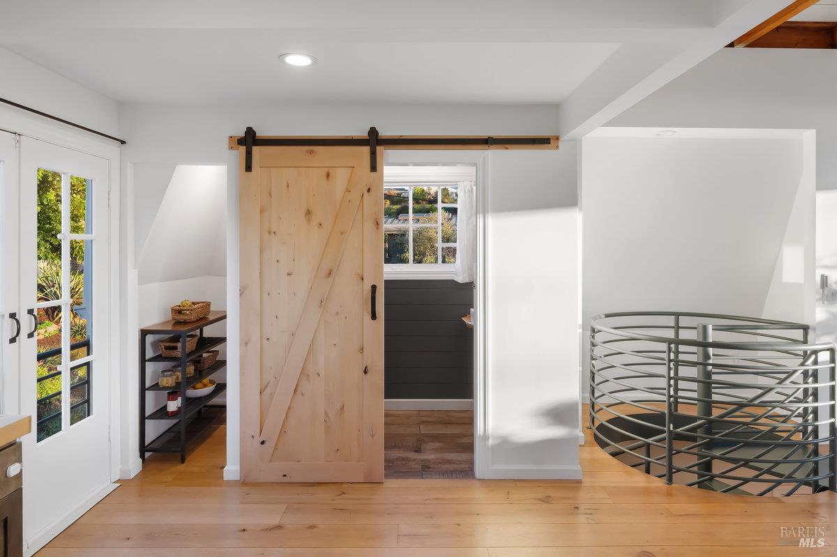 700 Ocean Avenue Point Richmond, CA 94801 - Photo 29 of 95 a view of entryway with wooden floor and cabinet
