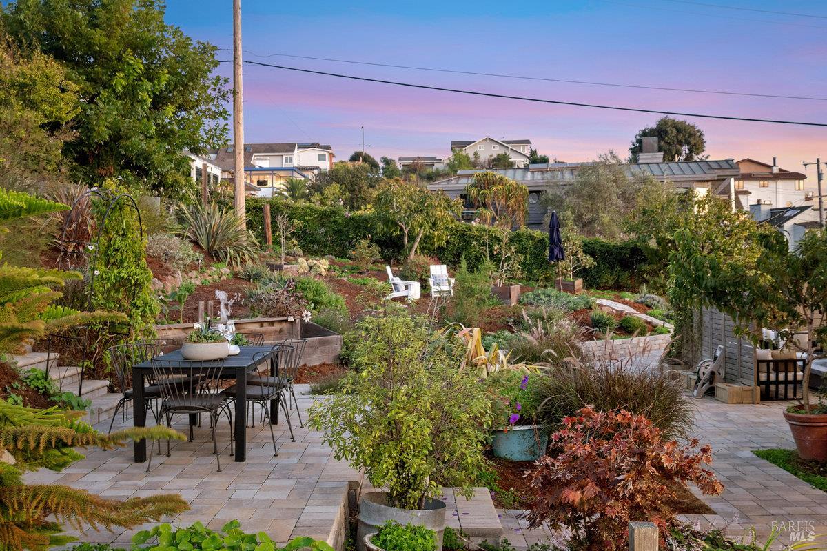 700 Ocean Avenue Point Richmond, CA 94801 - Photo 75 of 95 a view of a chairs and table in a backyard