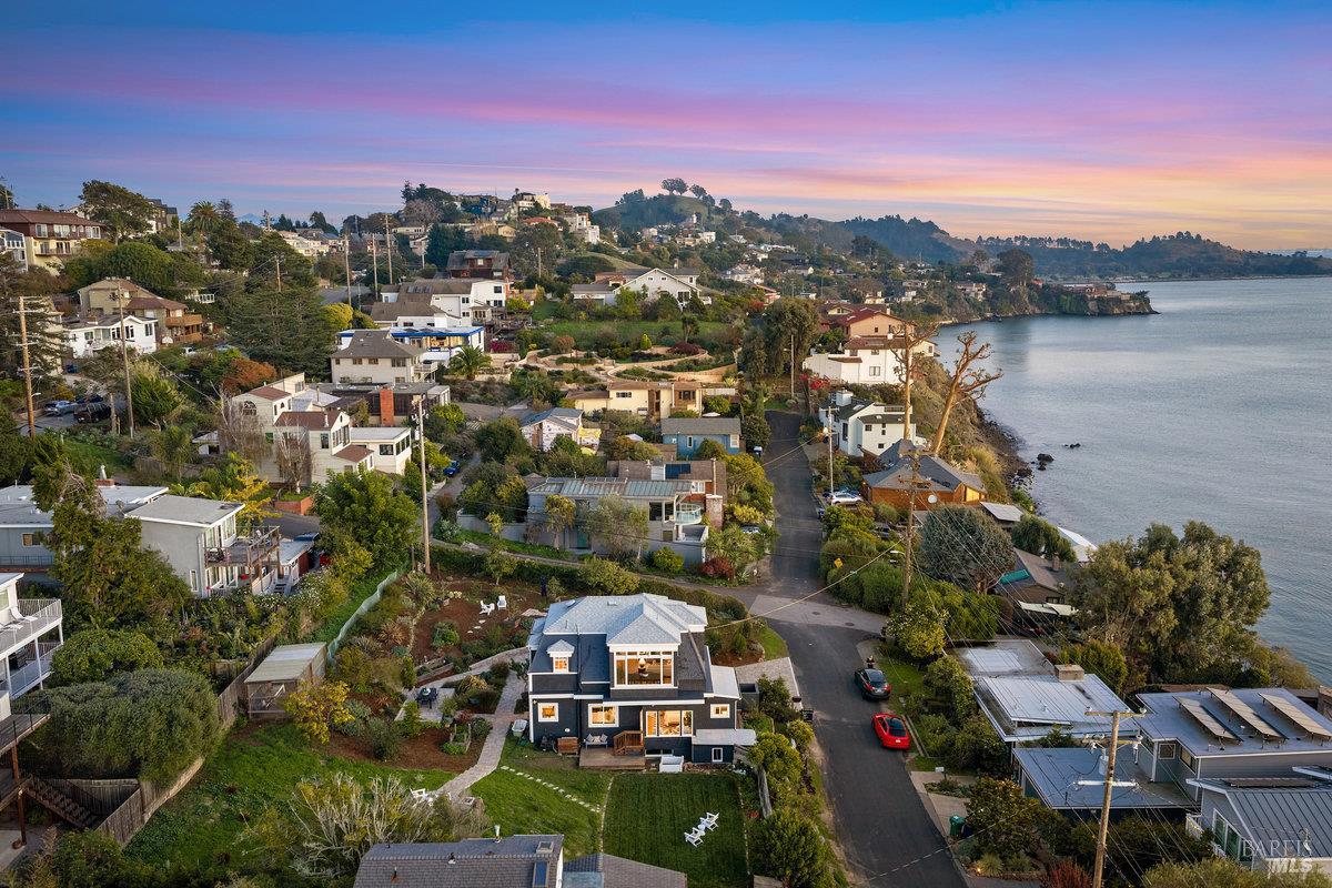 700 Ocean Avenue Point Richmond, CA 94801 - Photo 89 of 95 an aerial view of a city with lots of residential buildings lake and ocean view