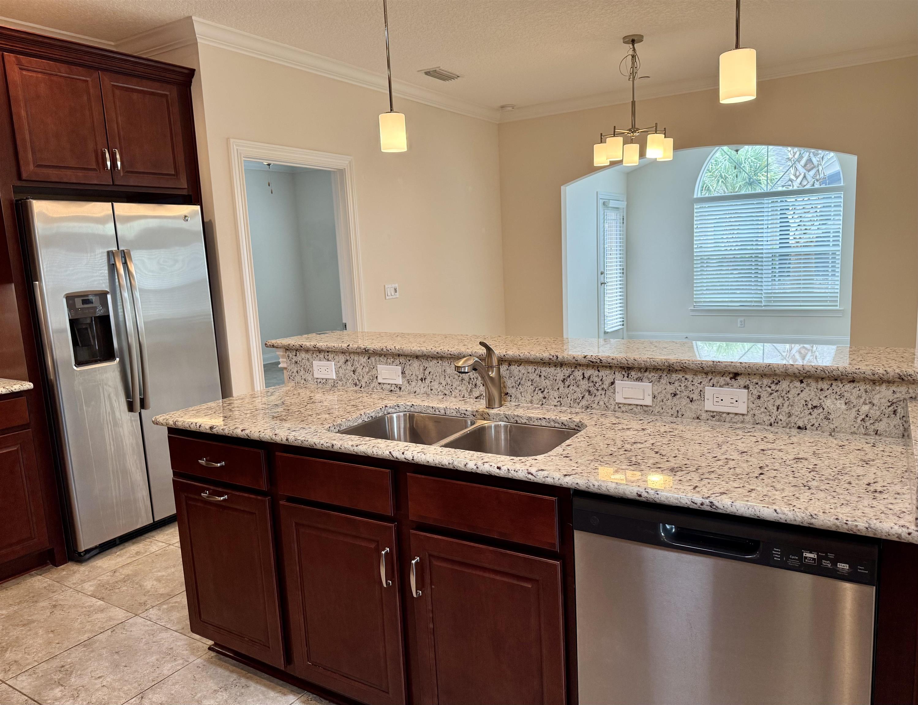 71 Utina Way St. Augustine, FL 32084 - Photo 13 of 37 a bathroom with a granite countertop sink and a mirror