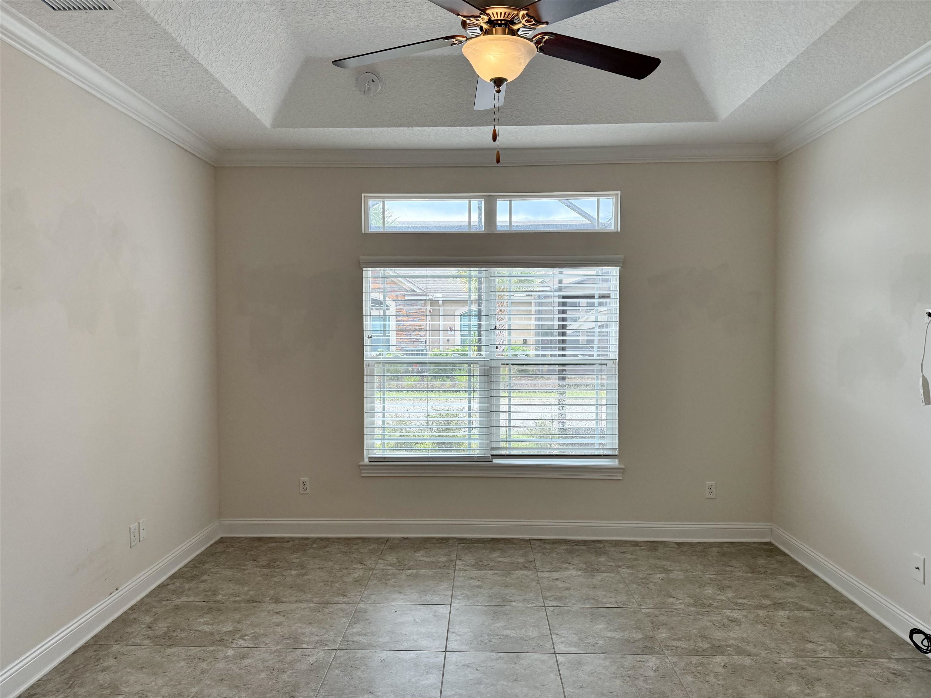 71 Utina Way St. Augustine, FL 32084 - Photo 23 of 37 a view of an empty room with a window