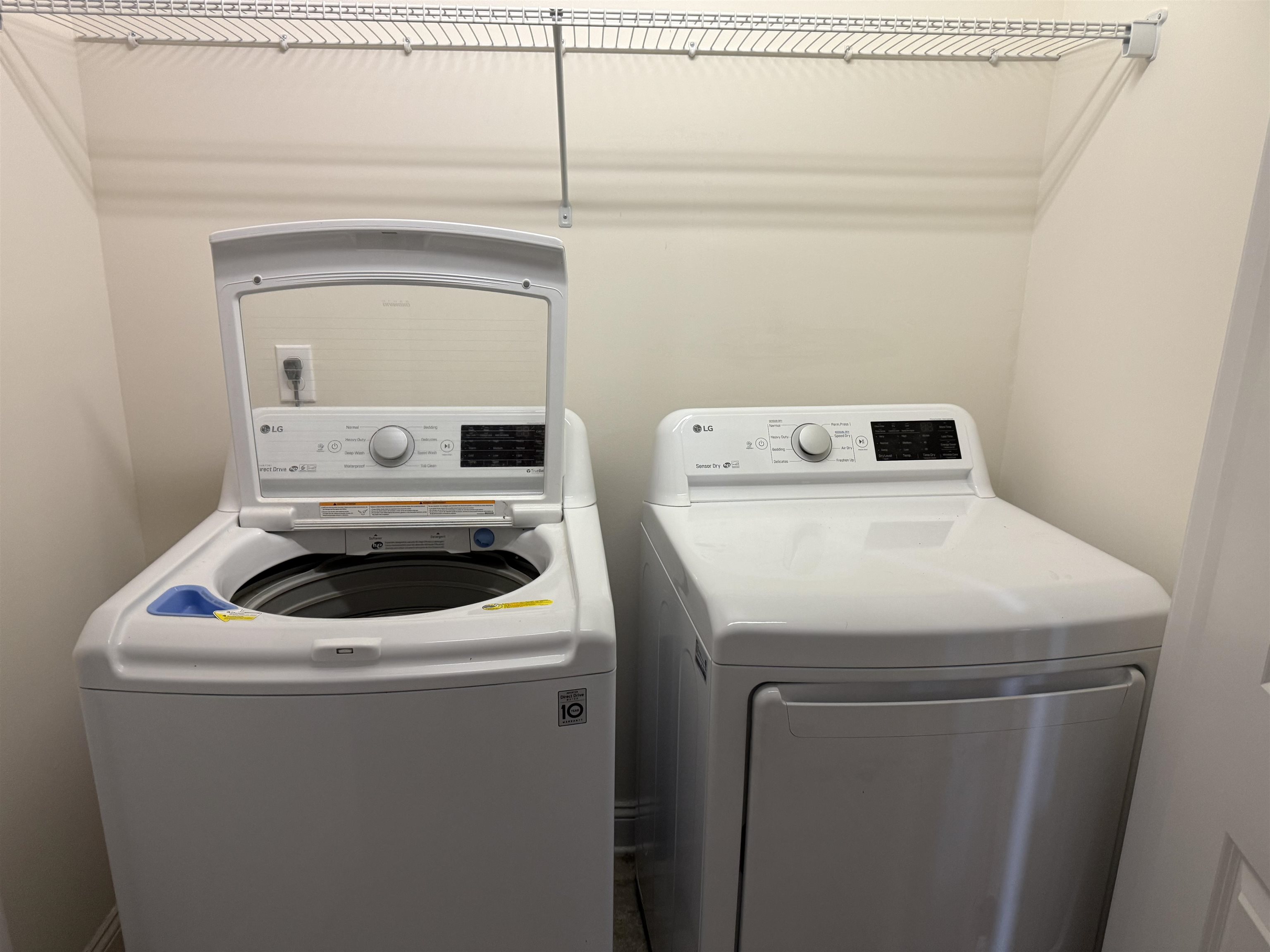 71 Utina Way St. Augustine, FL 32084 - Photo 27 of 37 a utility room with dryer and washer