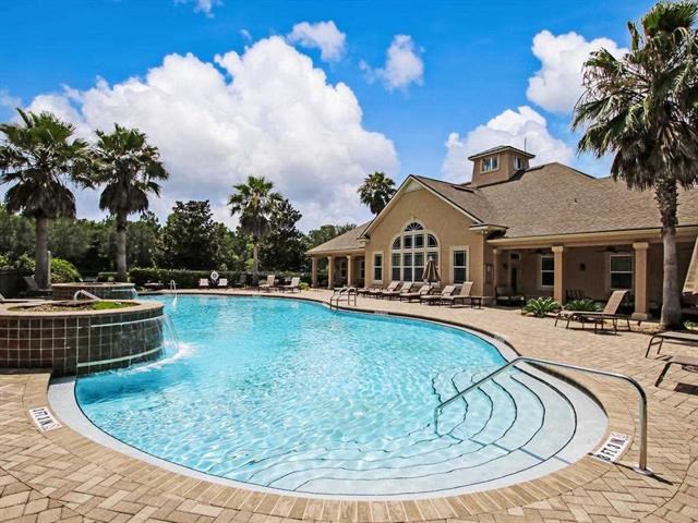 71 Utina Way St. Augustine, FL 32084 - Photo 34 of 37 a view of a house with swimming pool and sitting area