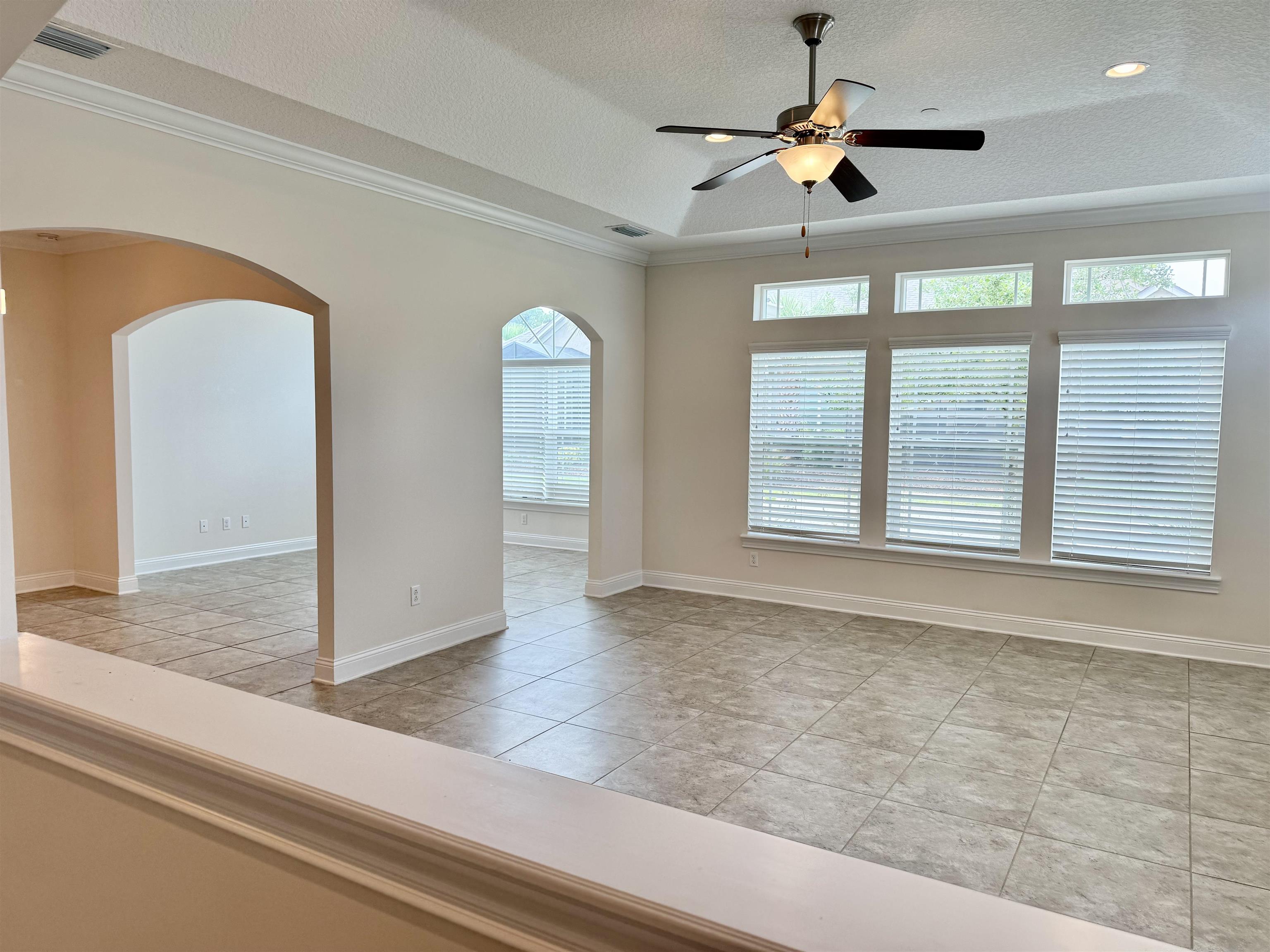 71 Utina Way St. Augustine, FL 32084 - Photo 5 of 37 a view of empty room with ceiling fan and window