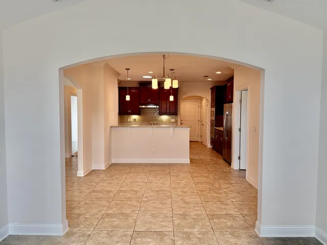 a view of a kitchen with a sink