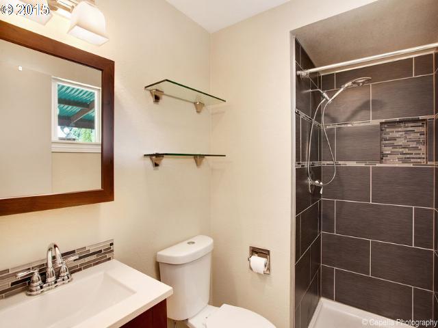 19705 Southwest Prospect Lane Aloha, OR 97078 - Photo 12 of 16 a bathroom with a sink toilet and shower