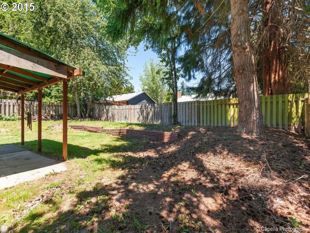 19705 Southwest Prospect Lane Aloha, OR 97078 - Photo 16 of 16 a view of a house with backyard and porch