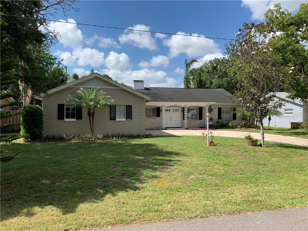 2344 Falmouth Road Maitland, FL 32751 - Photo 1 of 1 a front view of a house with garden