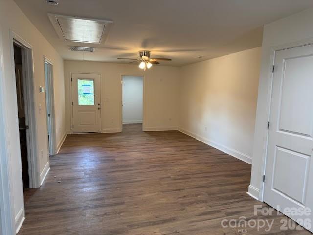 149 Camp Creek Road, Unit 103 Iron Station, NC 28080 - Photo 3 of 12 wooden floor in an empty room with a window