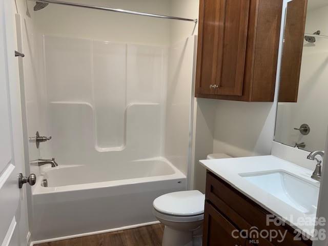 149 Camp Creek Road, Unit 103 Iron Station, NC 28080 - Photo 7 of 12 a bathroom with a sink a toilet and a bathtub